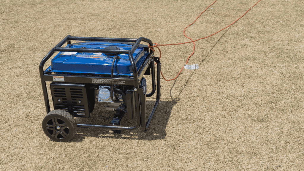 A portable generator sitting securely on the ground with wires providing reliable power for lights, cooking appliances, and charging electronic devices.