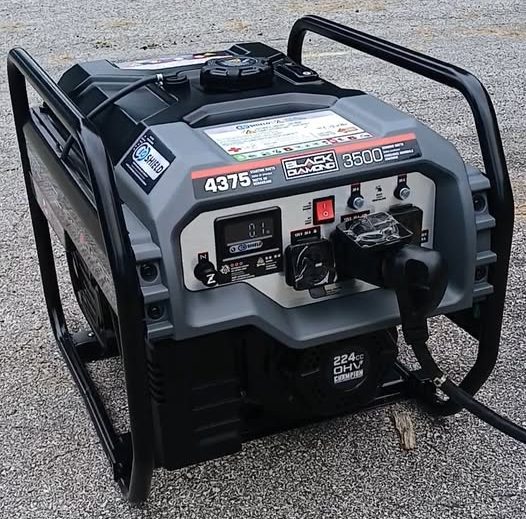 A rugged portable generator designed for camping trips, featuring a compact frame, large fuel tank, and durable handle for easy transport, providing reliable power to run camping lights, small appliances, and electronic devices in remote outdoor locations.